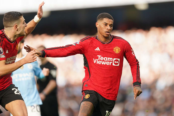 Marcus Rashford pictured (right) celebrating after scoring for Manchester United against Manchester City in the Premier League in March 2024